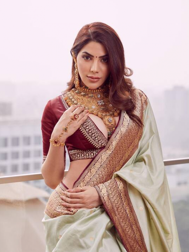 डीप नेक ब्लाउज के साथ साड़ी में निक्की तंबोली ने दिखाई दिलकश अदाएं