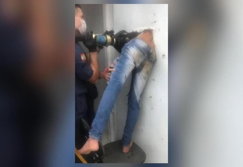 Brazilian Jail Porn - Prisoner gets stuck in hole in jail cell door while trying to escape in  Brazil