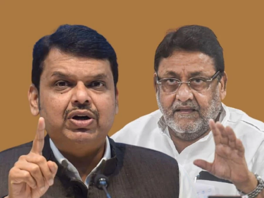 मलिक ने 'ड्रग्स पेडलर' के साथ फडणवीस व उनकी पत्नी की फोटो की शेयर; देवेंद्र ने दिया जवाब
