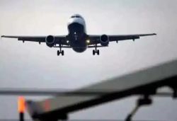 Woman passenger attempt to open door in flight of america