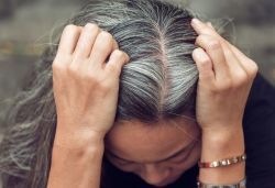 Scientists explain how stress causes graying of hair