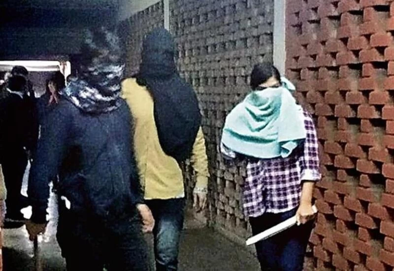 Police identify masked woman in armed group at JNU as DU student