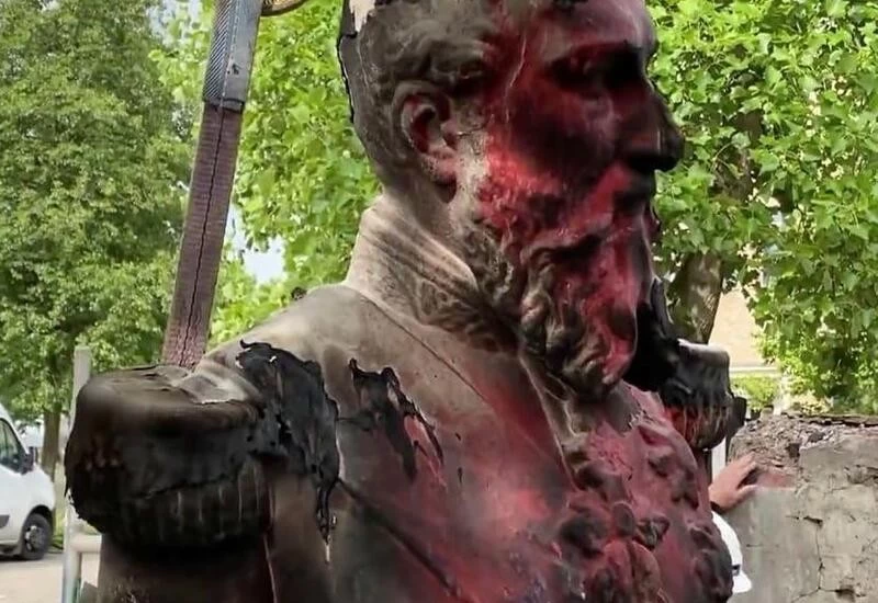Vandalised statue of King Leopold II removed in Belgium amid protests