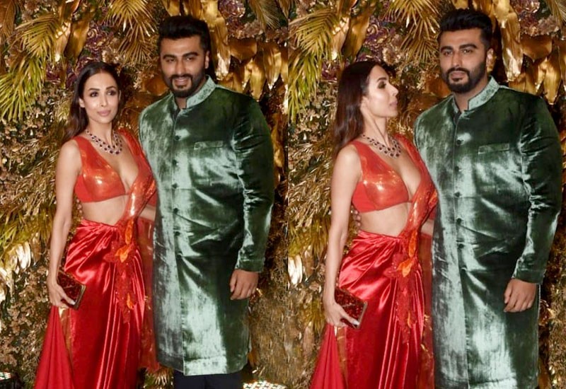 कॉन्ट्रास्ट कलर के आउटफिट मे अर्जुन कपूर और मलाइका अरोड़ा 