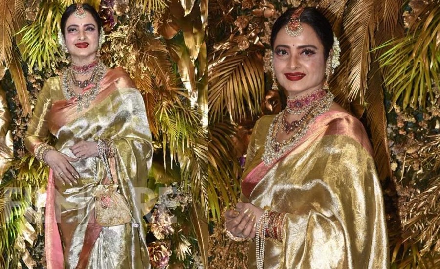 Rekha Dazzles Her Way In A Golden Saree At Wedding Reception