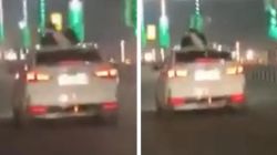 VIDEO Lovers Romance Out of Car Sunroof in Lucknow Police Begin Search