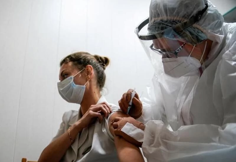 Moscow begins mass COVID-19 vaccination with its Sputnik V shot